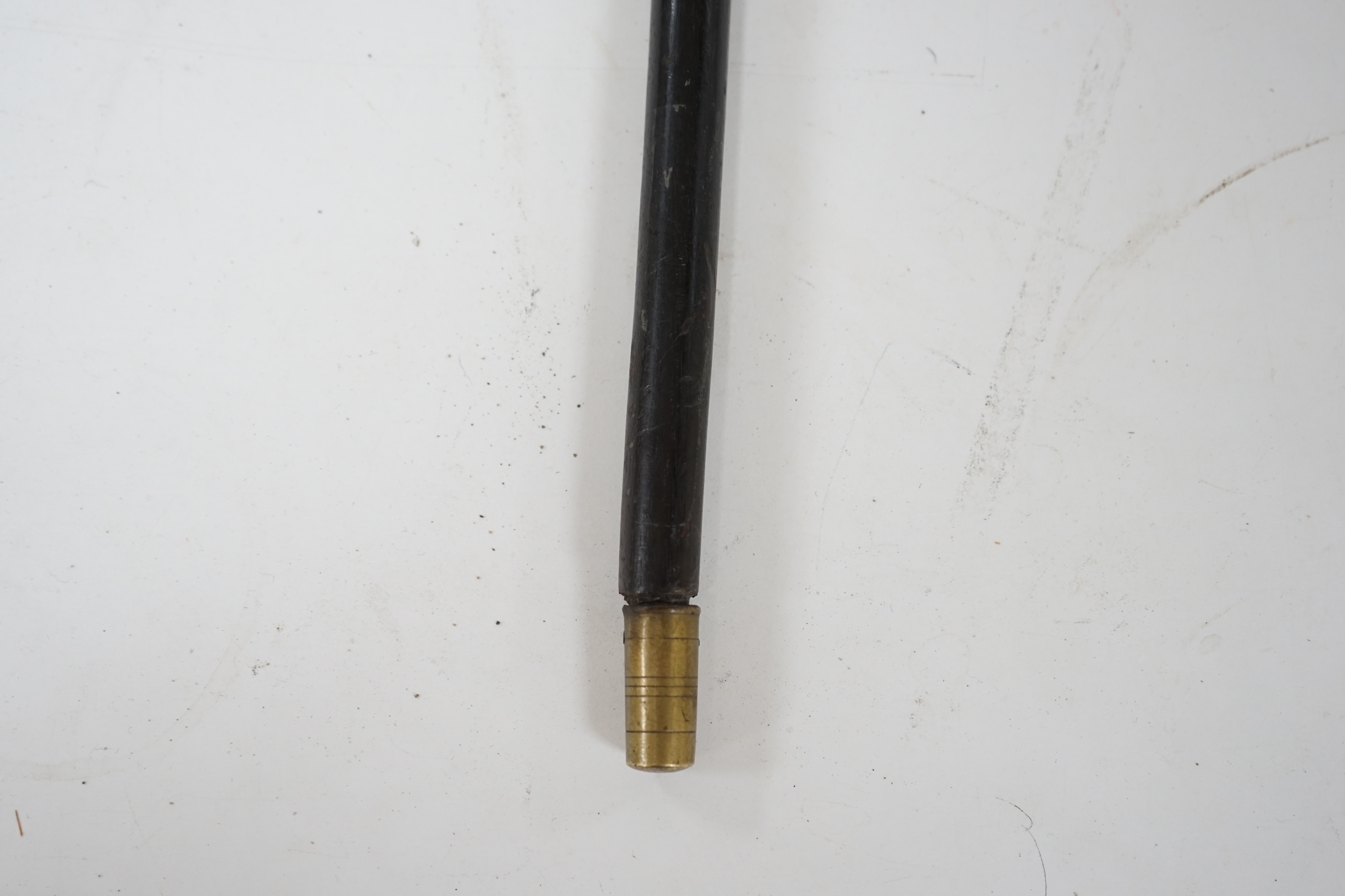 A 19th century Chinese export silver ‘dragon’ handled carved ebony walking cane, handle signed, 81cm long. Condition - fair to good